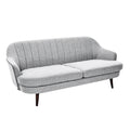 **Sofa tapicerowany w stylu skandynawskim z drewnianymi nóżkami**